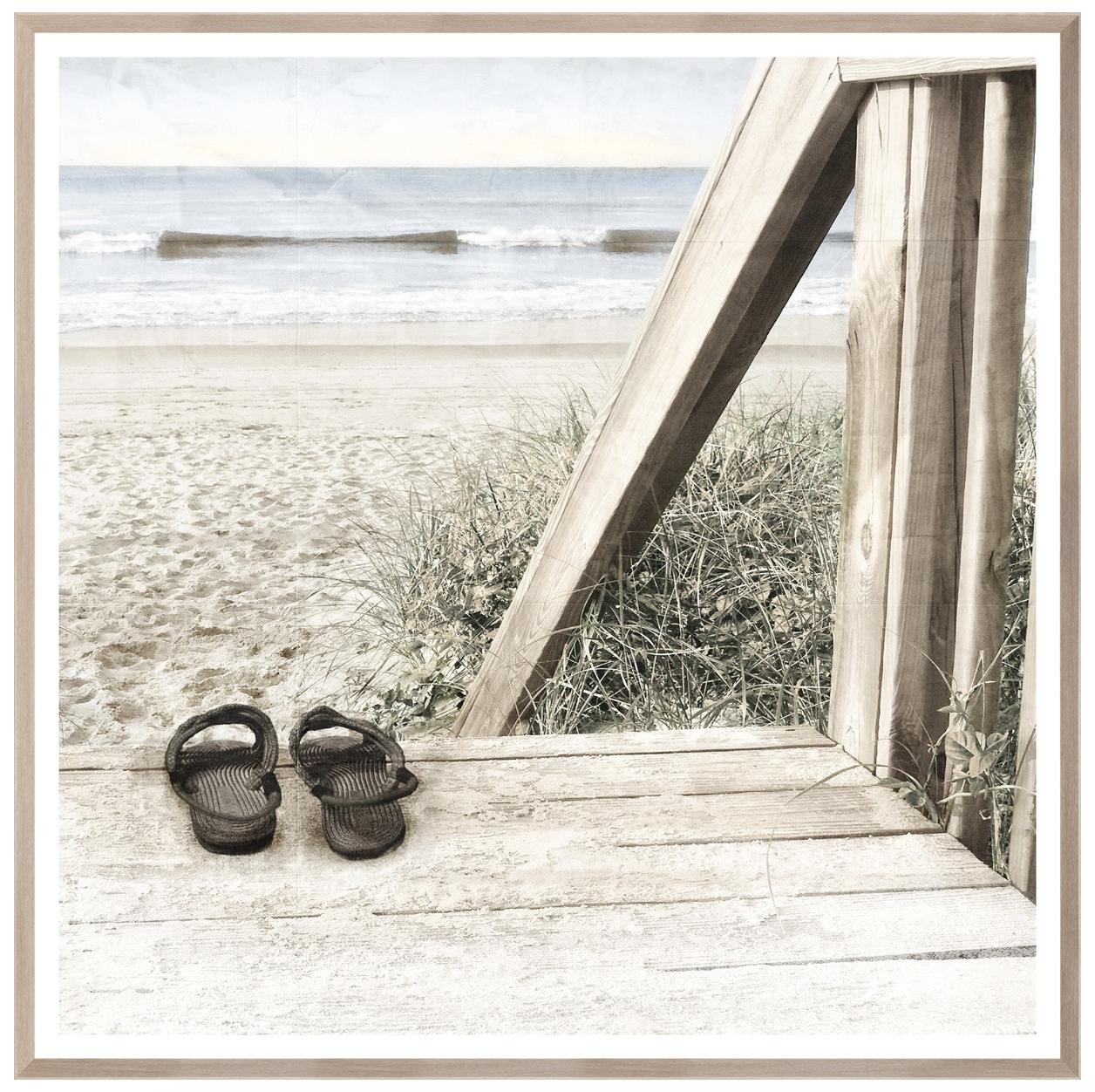 framed art of sandals at the end of the boardwalk looking out at the water