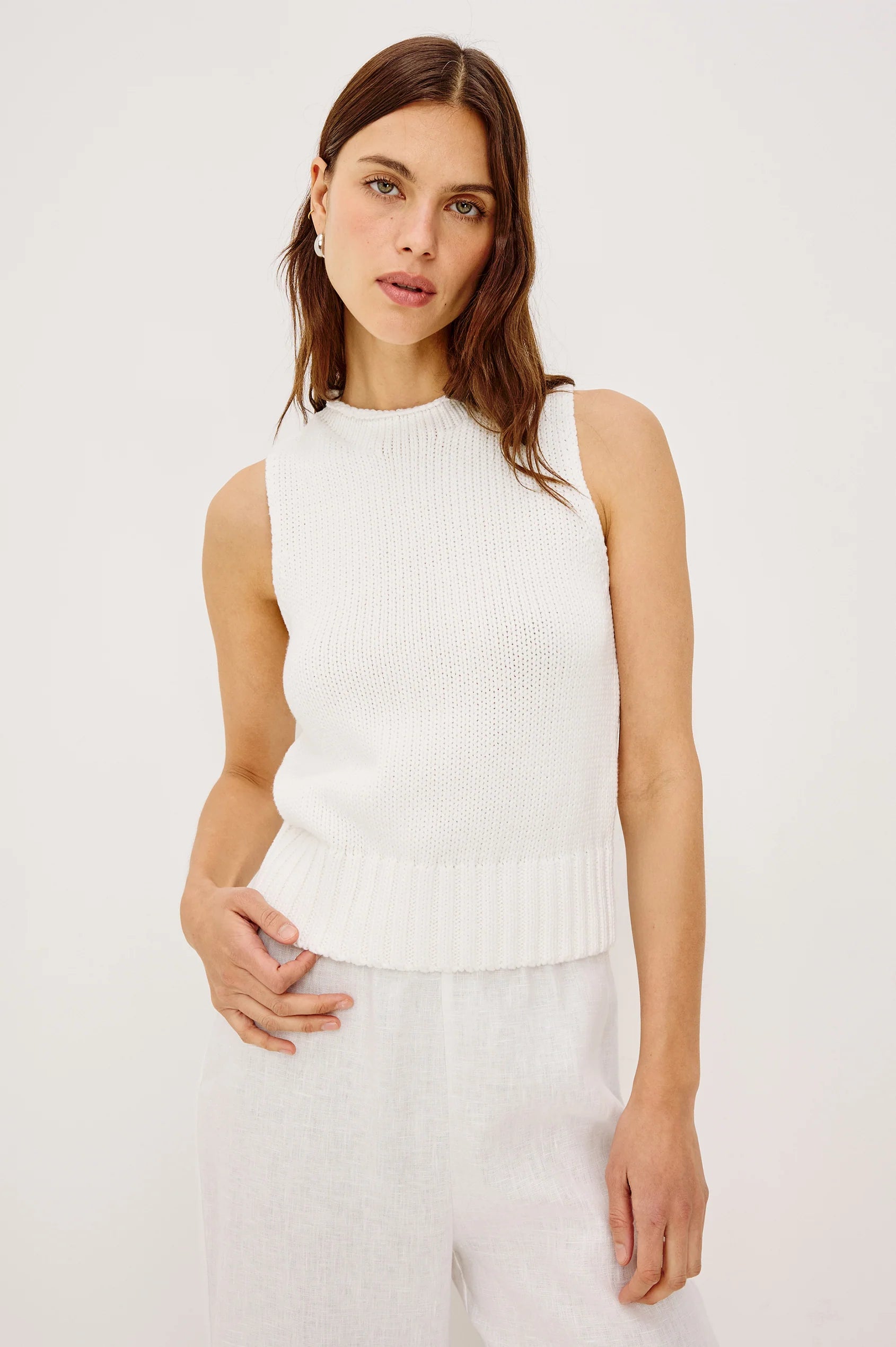 white sleeveless knit top
