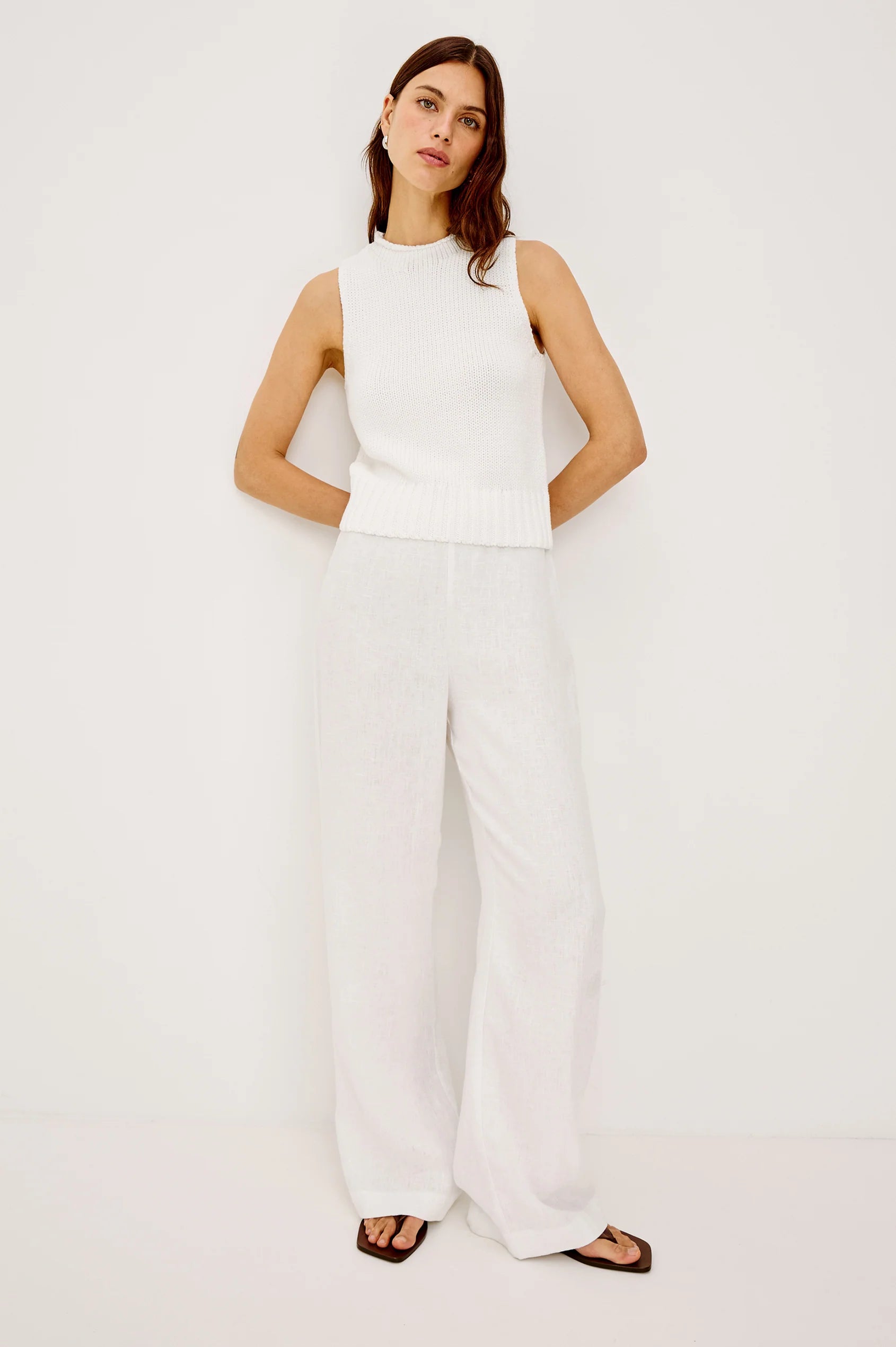 white sleeveless knit top