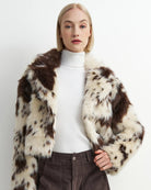 brown and white cow print crop jacket