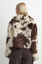 brown and white cow print crop jacket