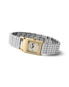 silver band and gold face watch