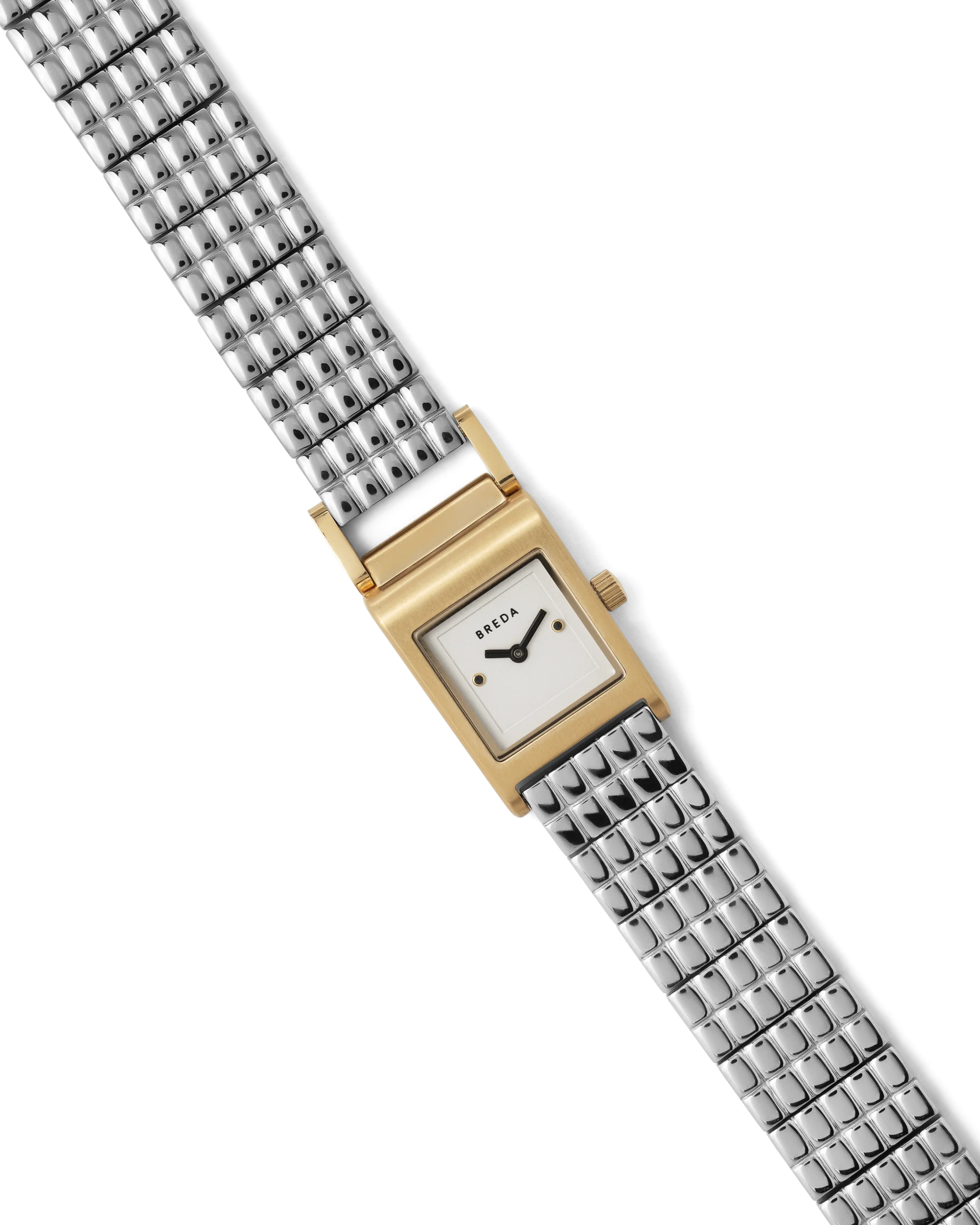silver band and gold face watch
