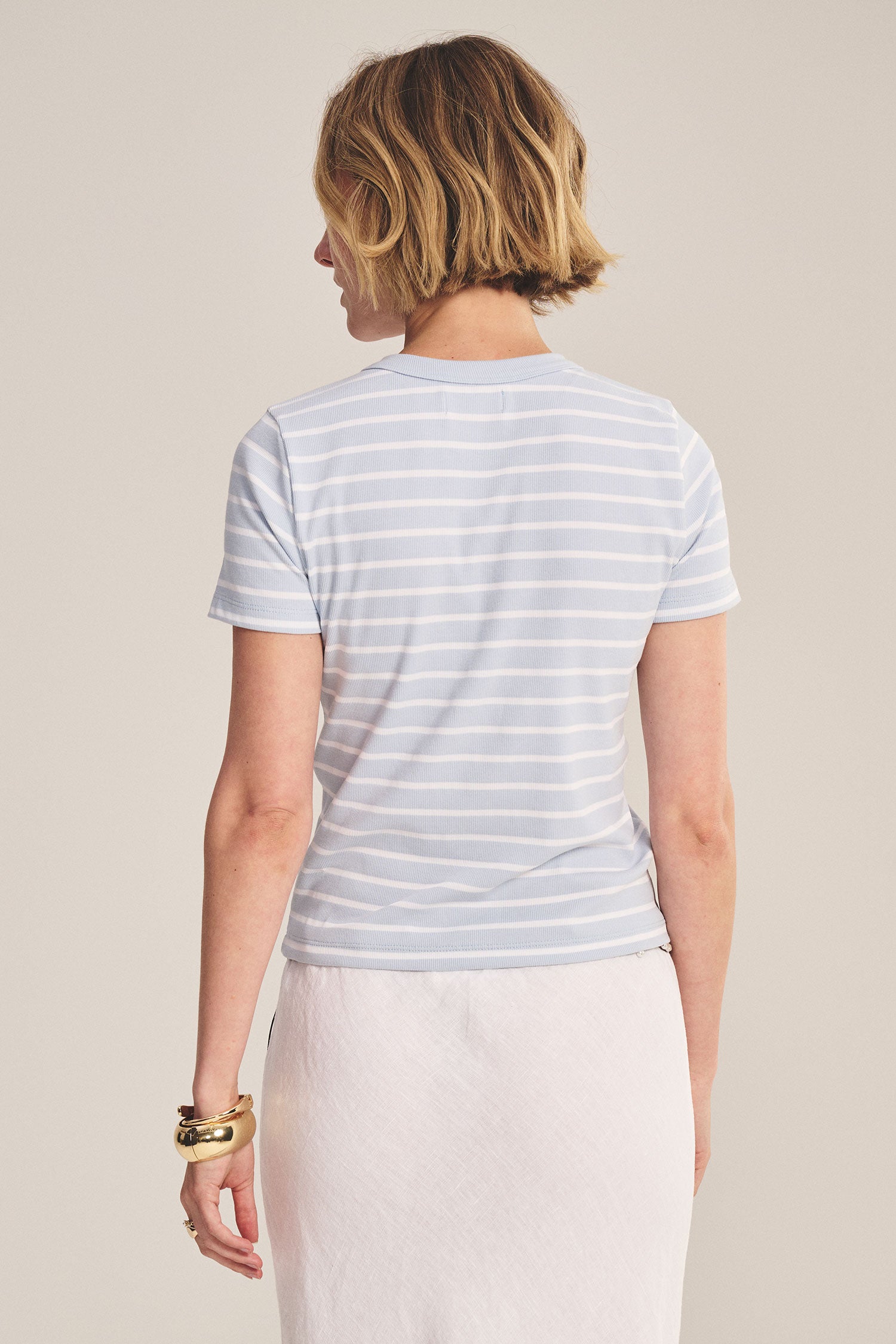 blue t-shirt with white stripes