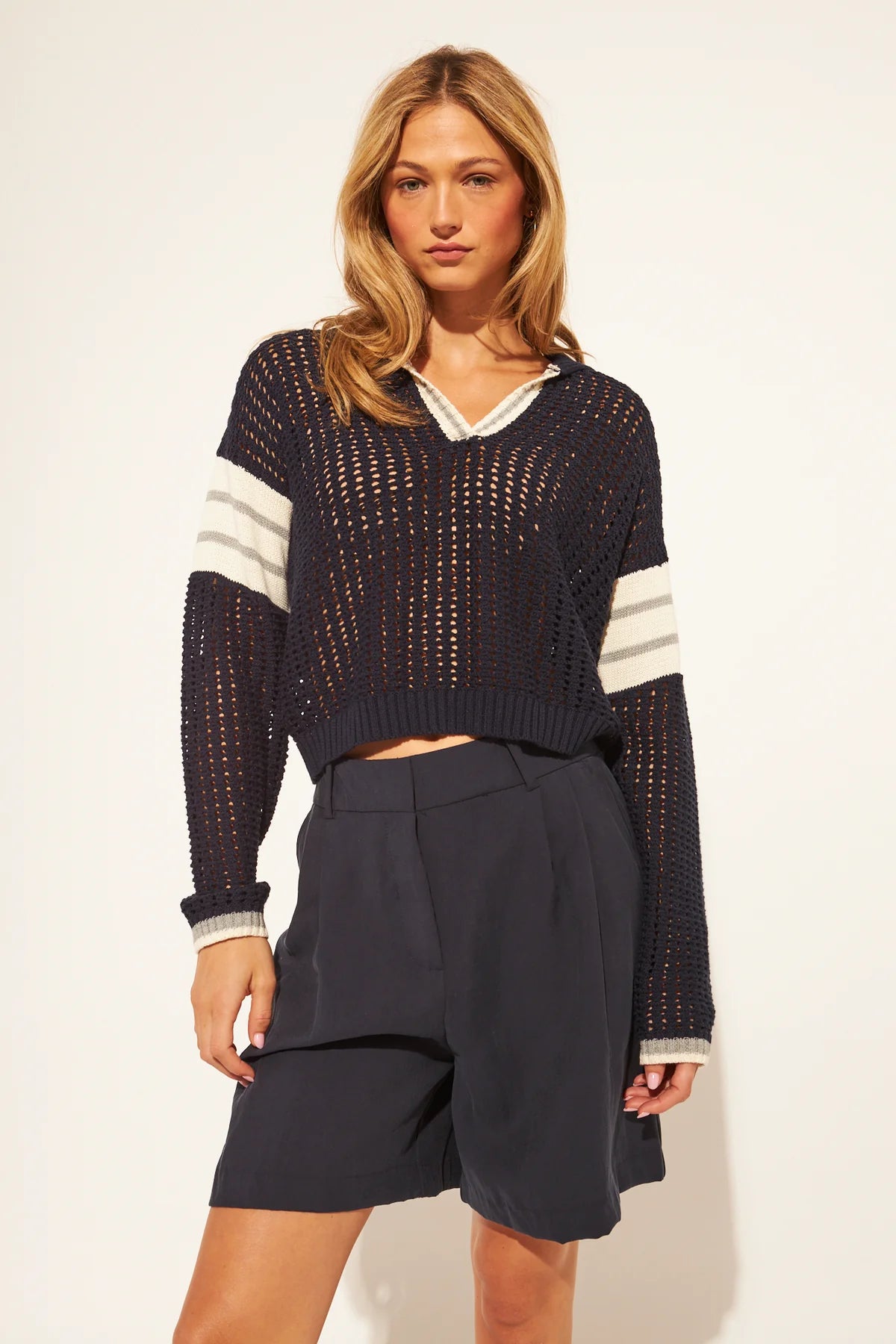 navy crochet long sleeve with cream stripes on the arms