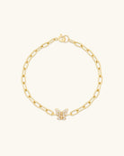 gold link bracelet with a butterfly charm