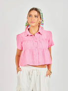 pink cropped tiered short sleeve blouse