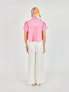 pink cropped tiered short sleeve blouse