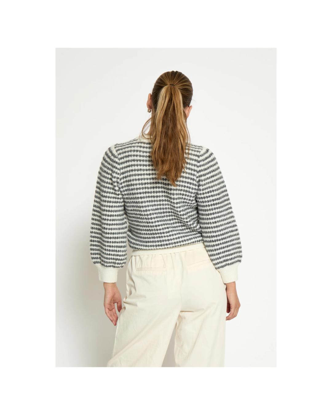 sweater with white and black stries