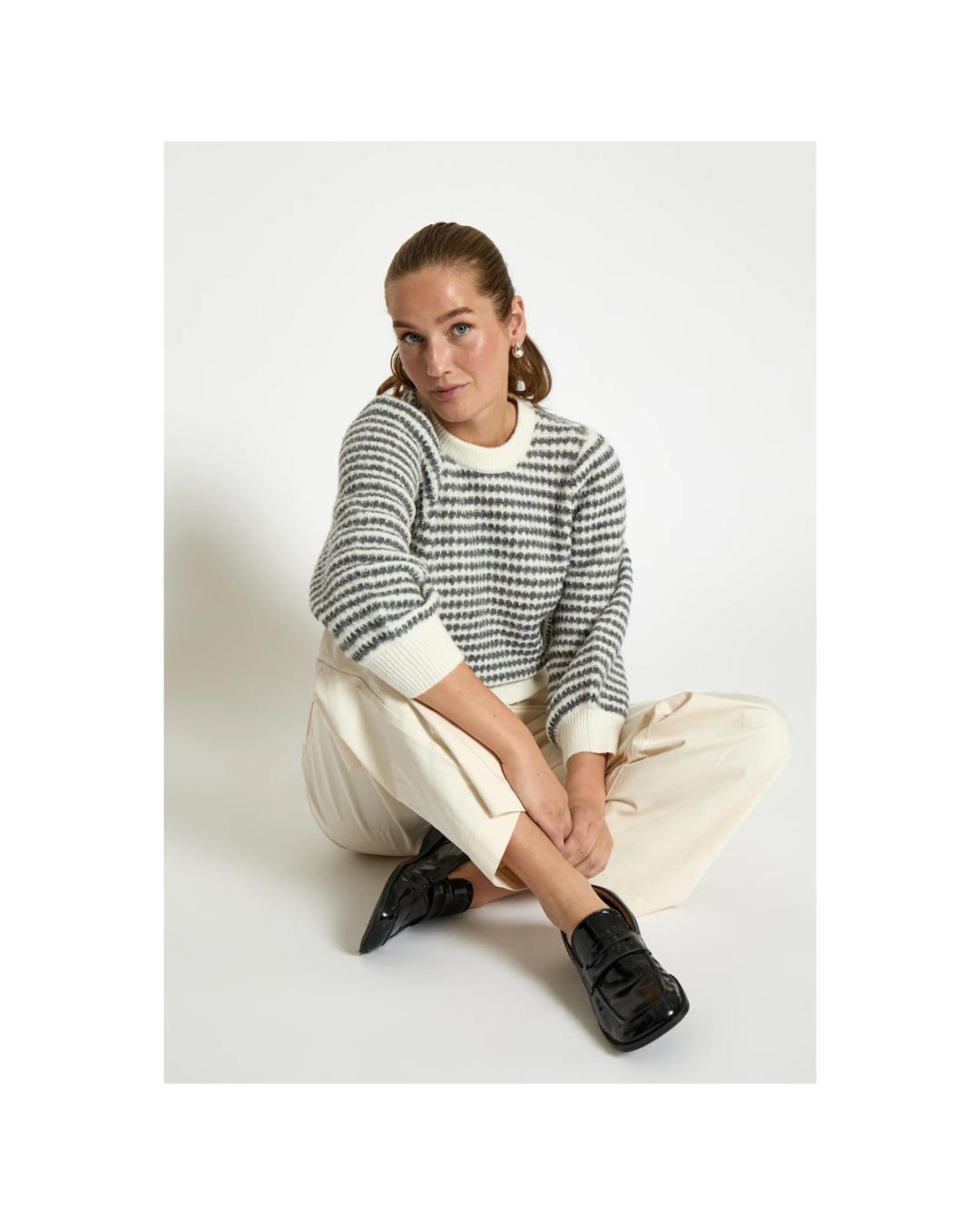 sweater with white and black stries