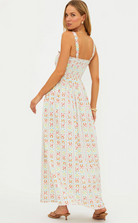 mini dress in white with multi colour floral print all over 