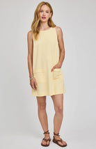 mini yellow dress with pockets on the front