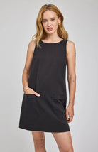 mini black dress with two pockets on the front