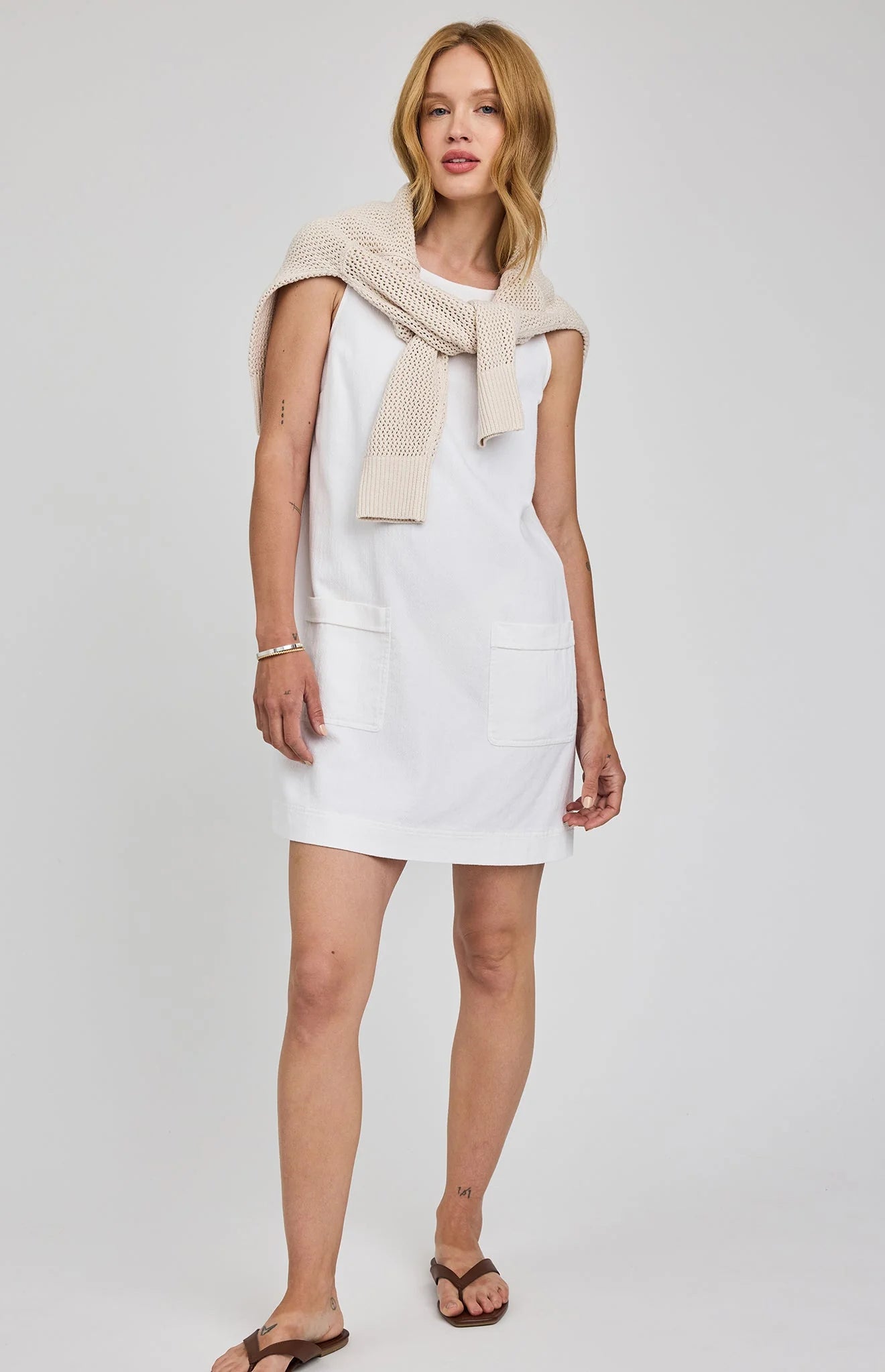 mini white dress with two pockets on the front