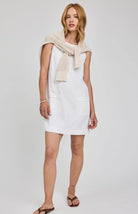 mini white dress with two pockets on the front