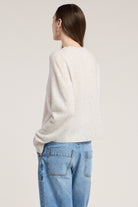 white long sleeve sweater