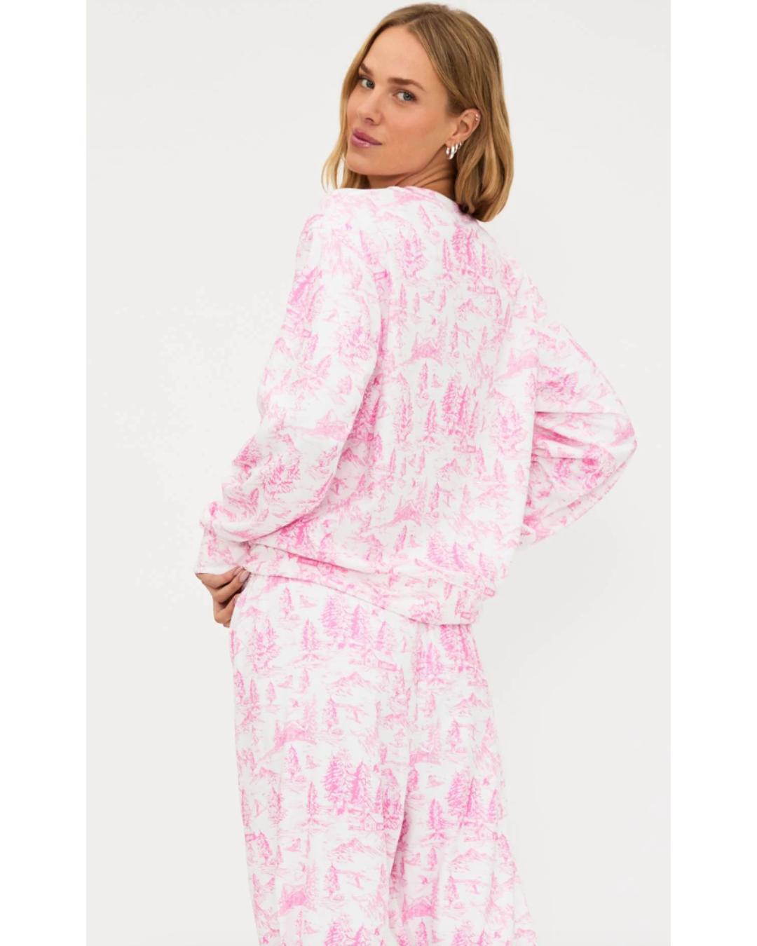 pink sweatshirt that says SKI