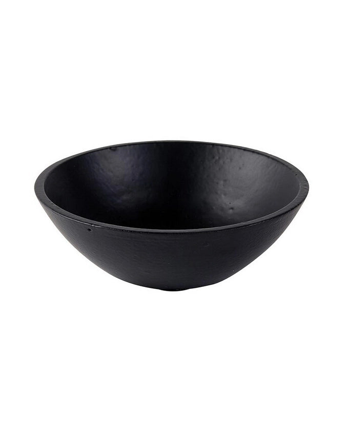 a black cast iron bowl