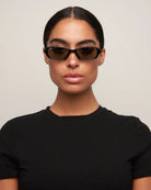 rectangular black sunglasses with grey lenses