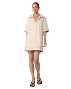 beige mini dress with pockets on the chest and a collar