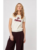 cream t-shirt with je t'aime written in red