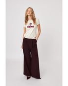 cream t-shirt with je t'aime written in red