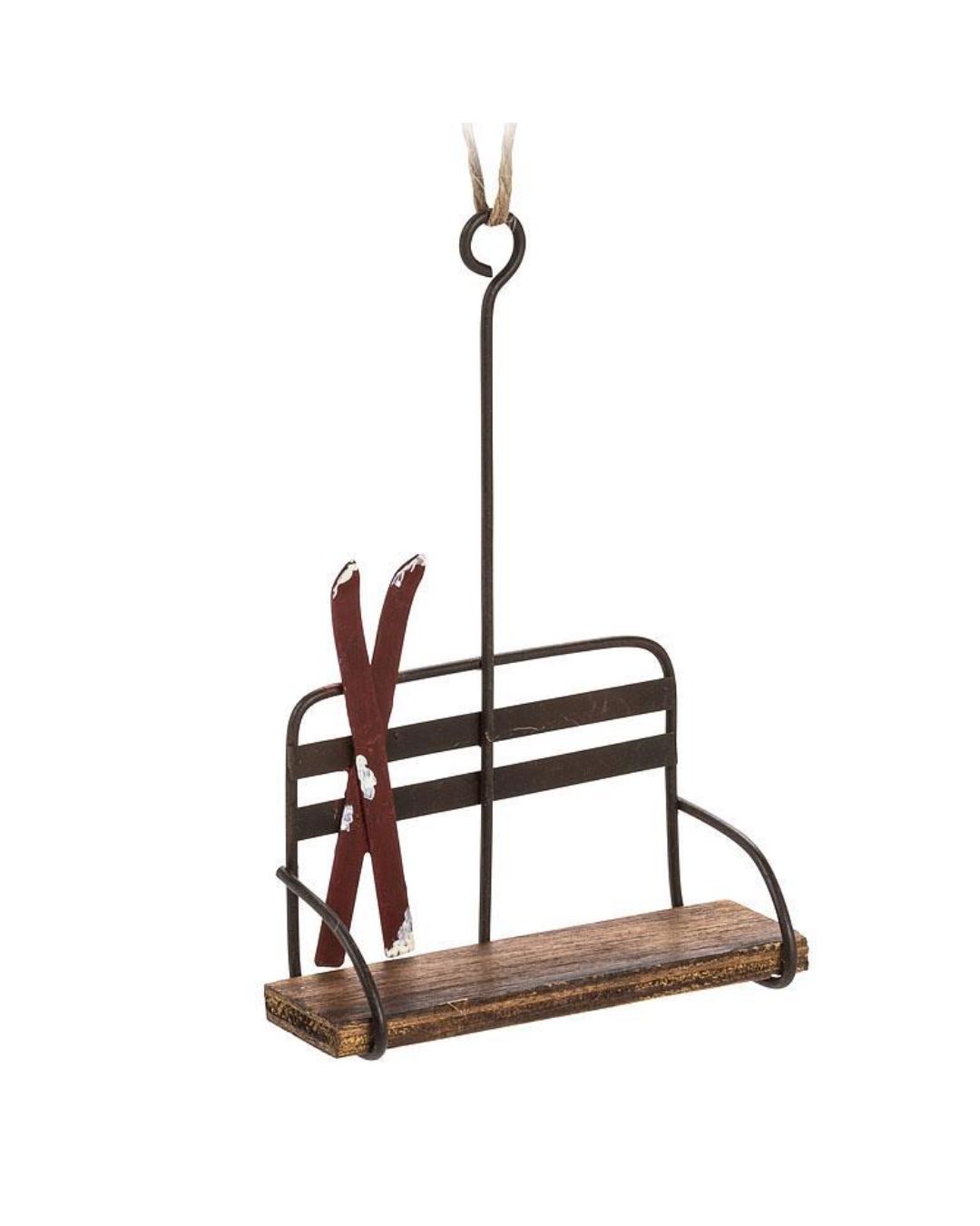 chair lift ornament with red skis