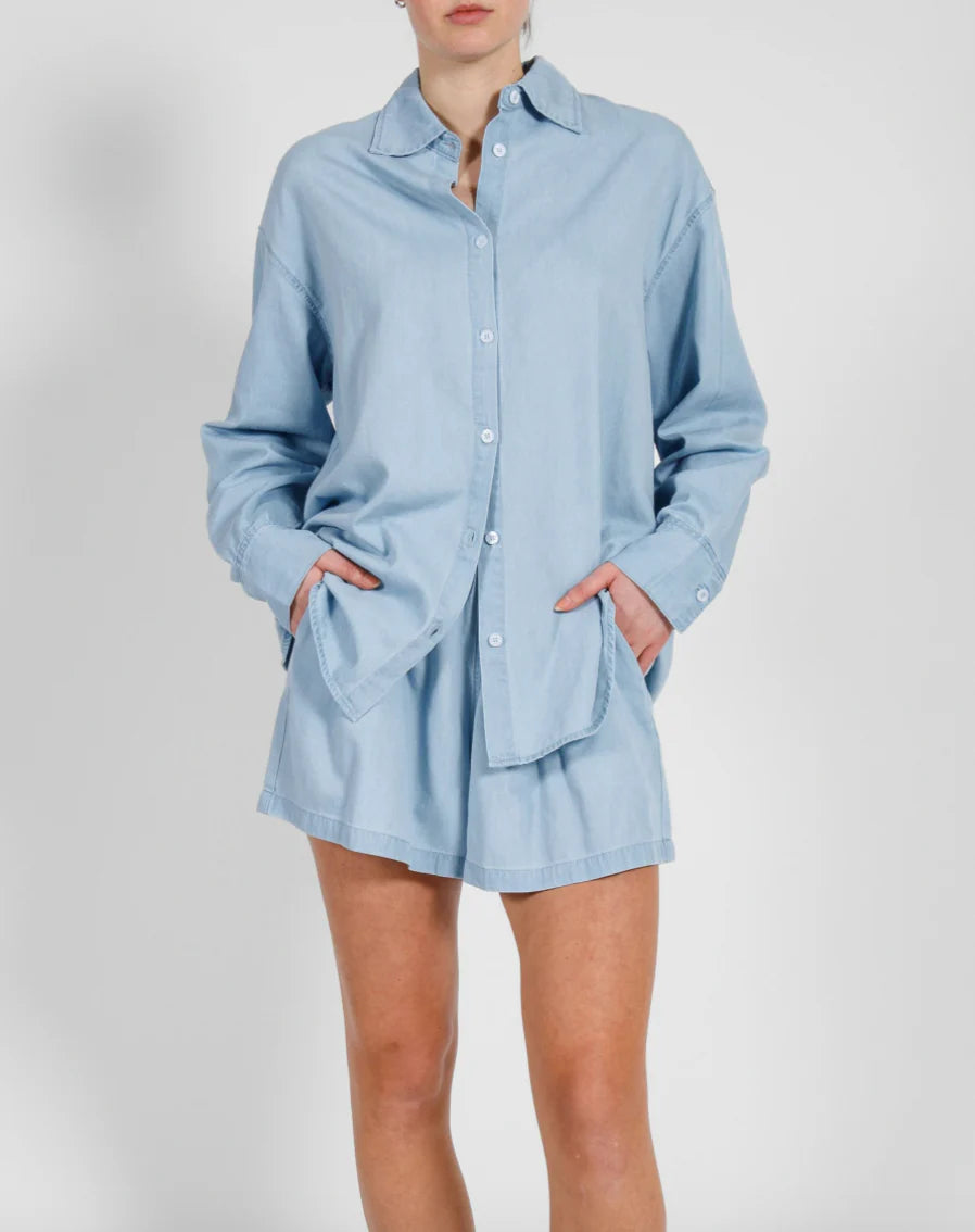 button up blouse with pearl buttons in a oxford blue