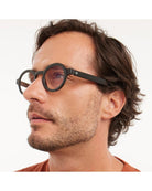 round eyeglasses with a black frame