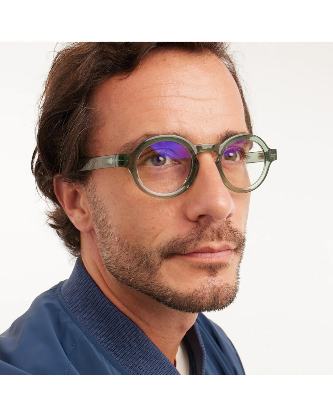 eyeglasses with a green frame