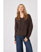brown sweater with a v-neck