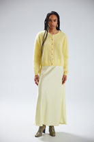 bright yellow cardigan