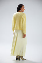 bright yellow cardigan