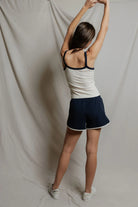 cream tank with contrast navy piping