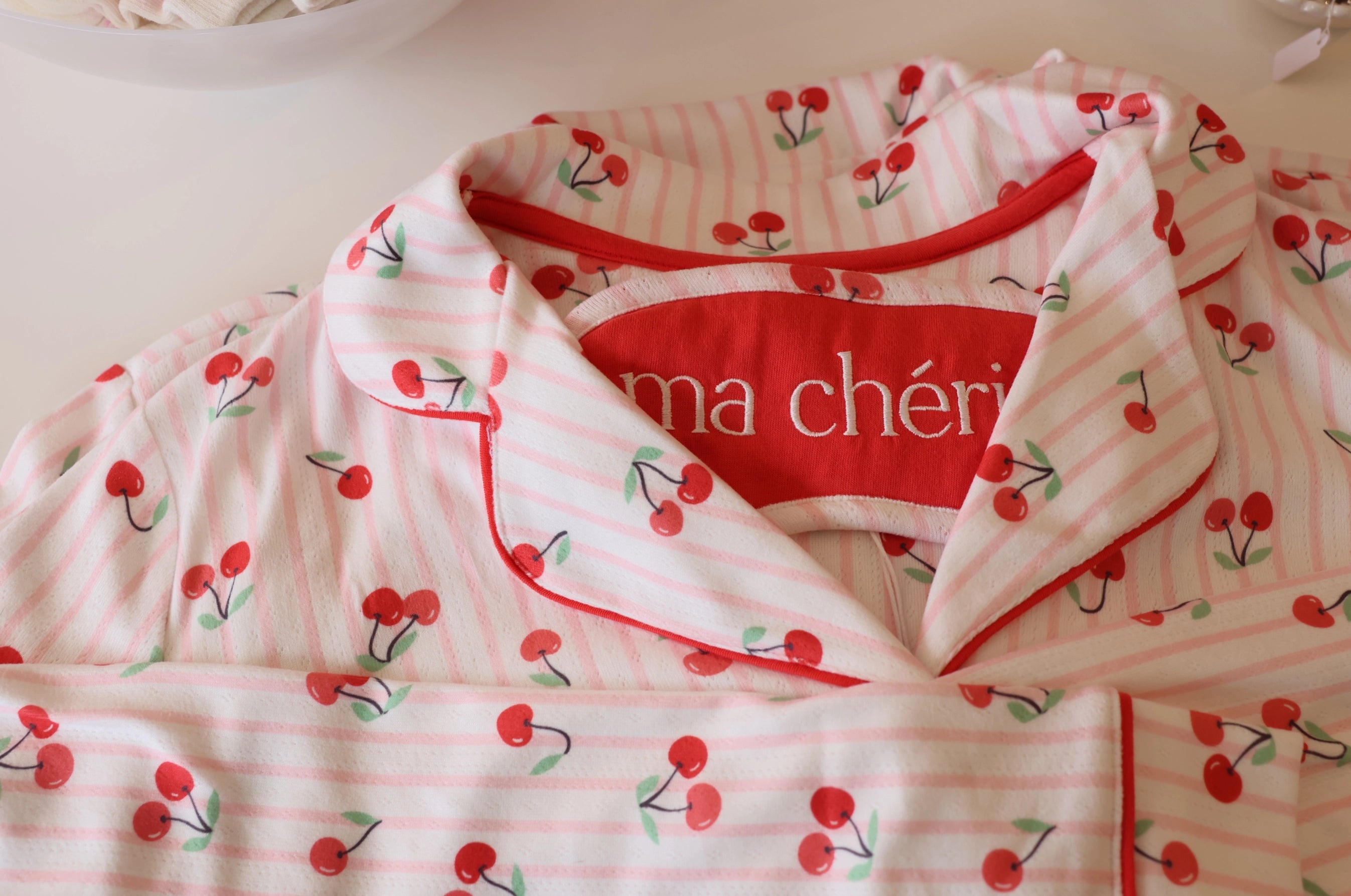 a close up look at Valentines Day sleepwear with cherries on it
