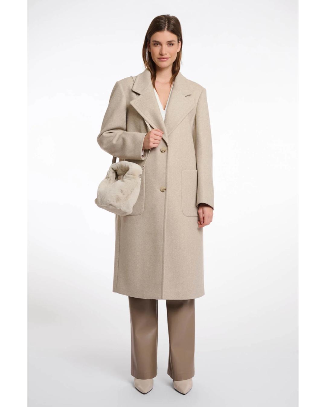 small crossbody bag in a beige faux fur