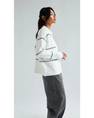 white cardigan with a collar and with black stripes