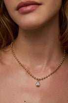 gold round ball chain with silver pear diamond pendant necklace
