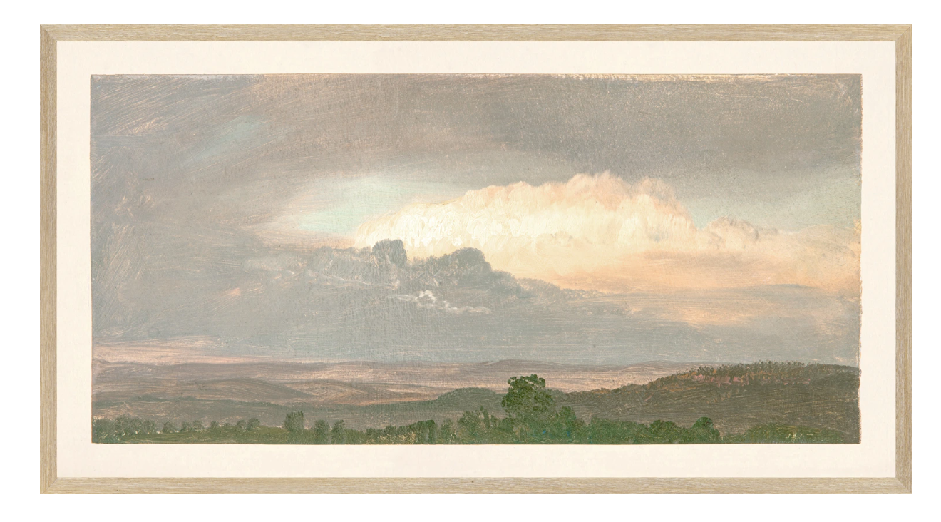 framed art of clouds over a hill