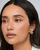 gold statement earrings