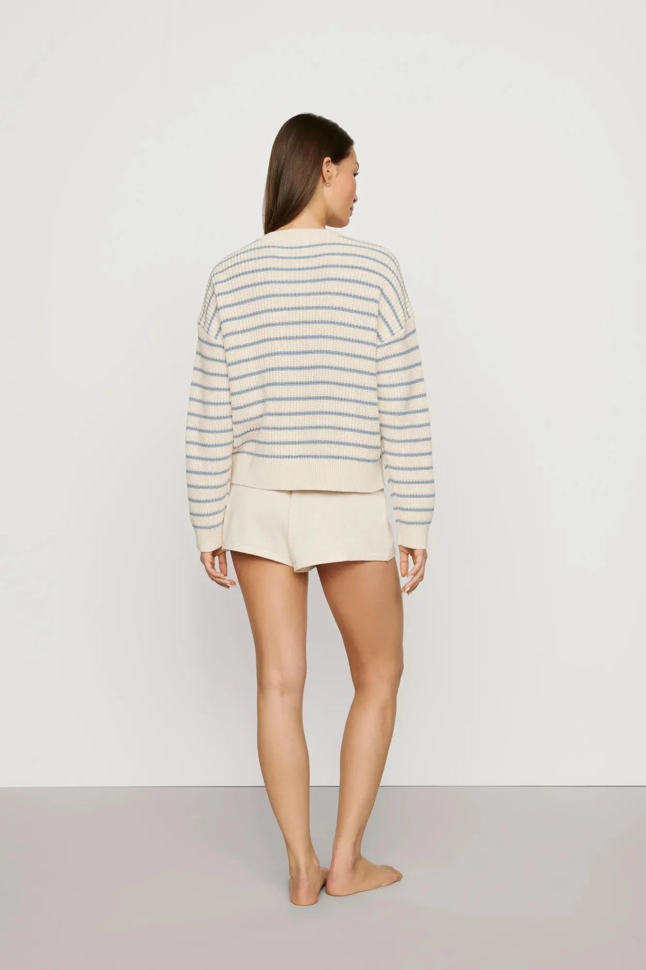 cream sweater with a light blue stripe