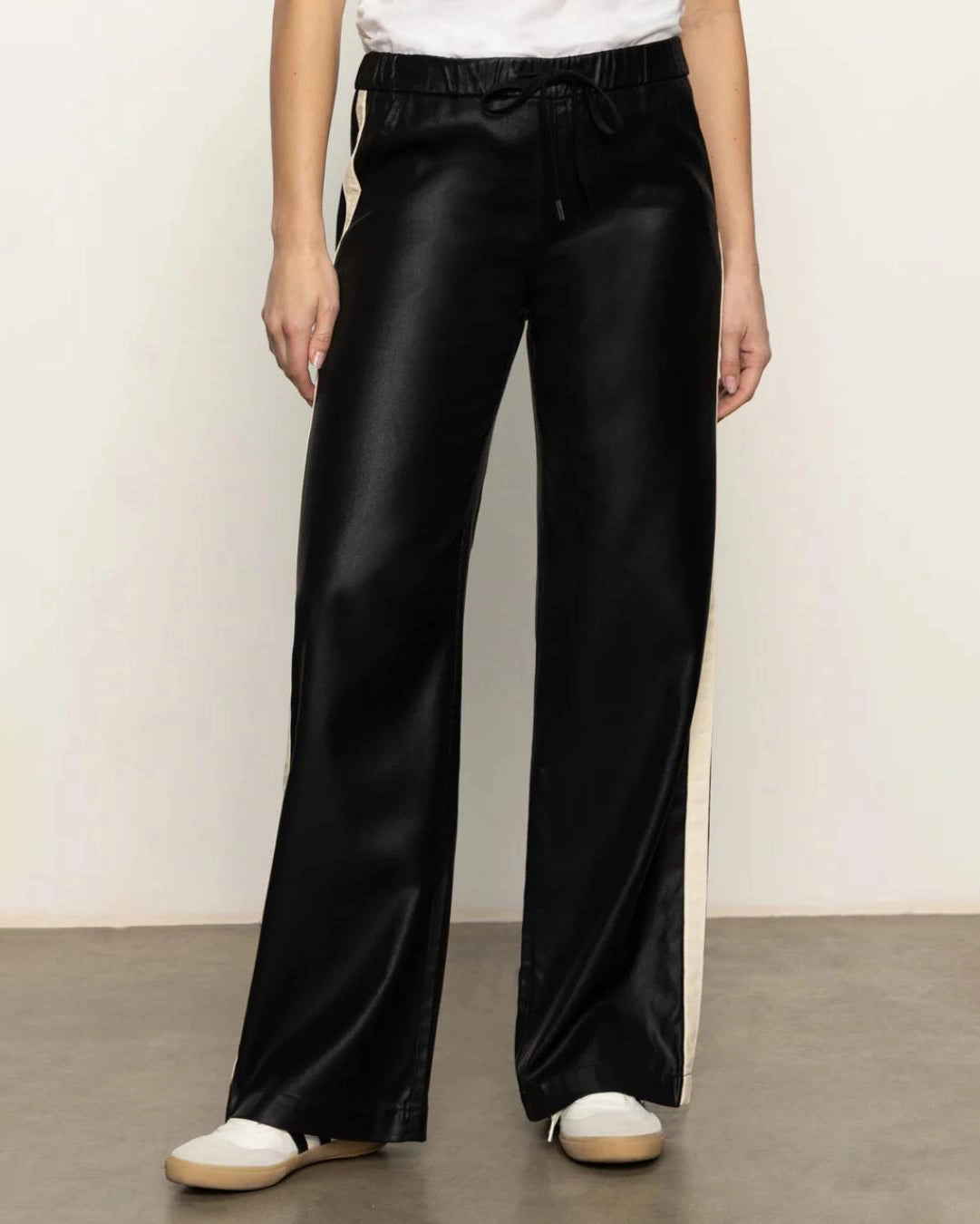 black track pant with white stripe down the side