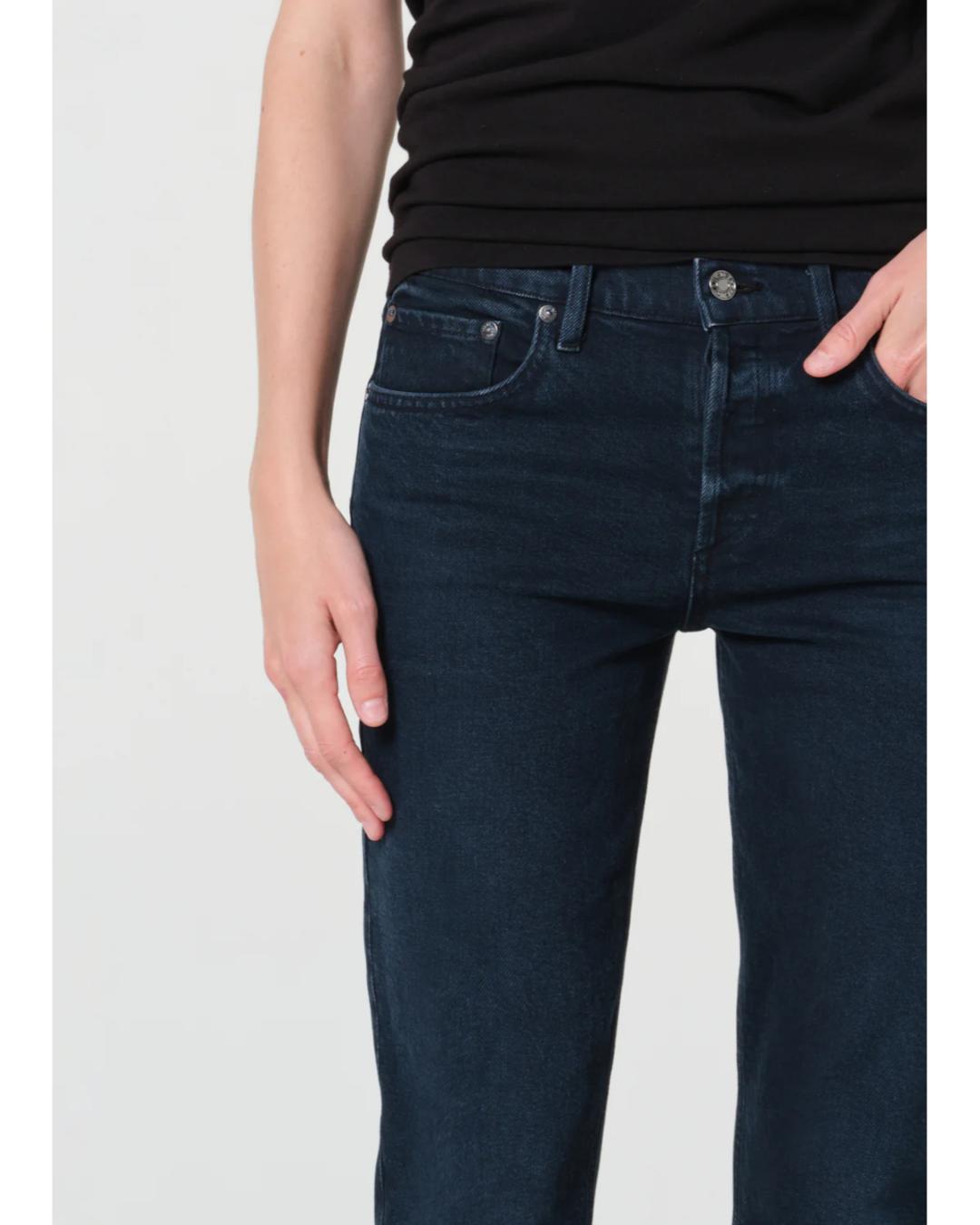 high rise dark blue denim pant with a straight leg to the ankle