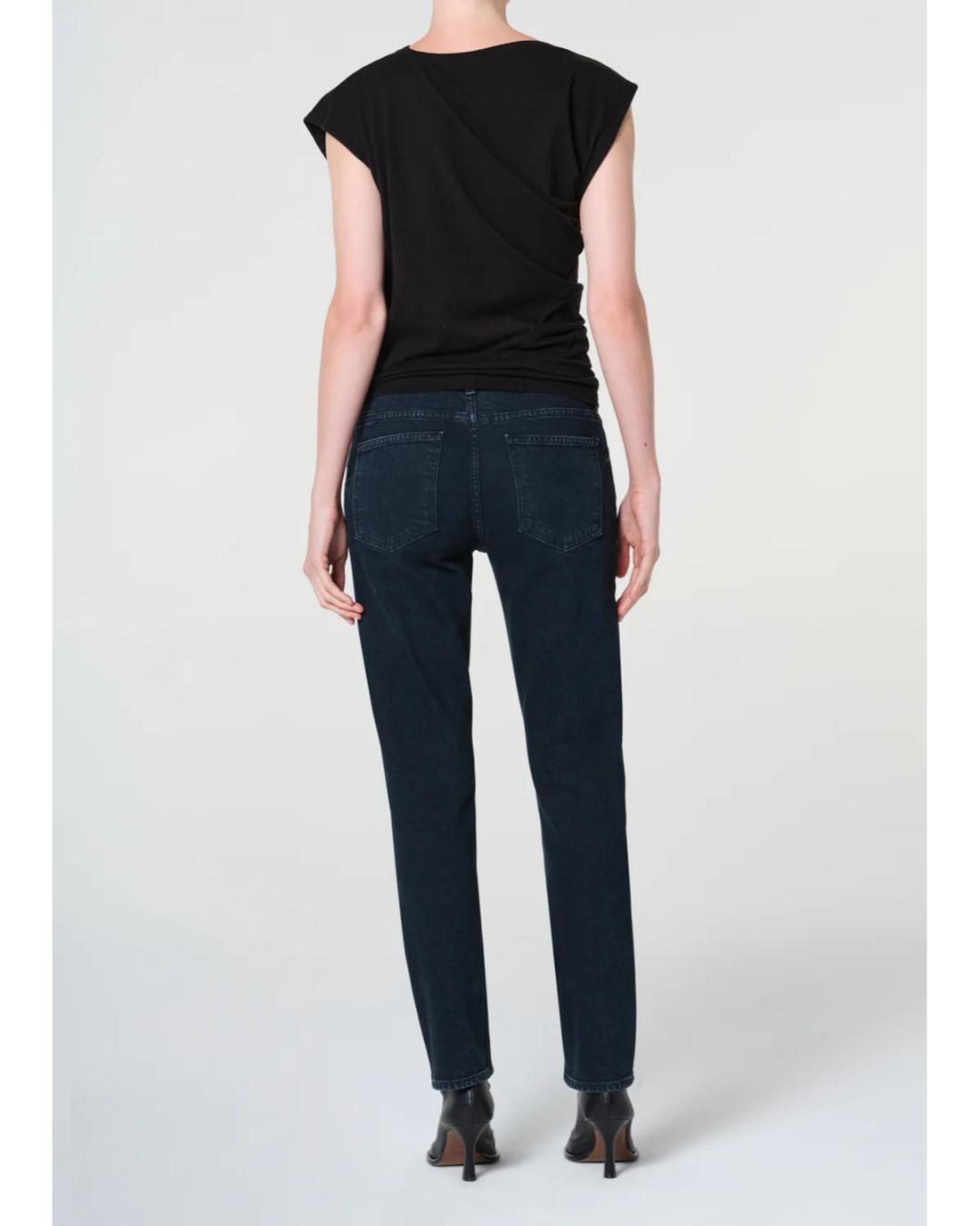high rise dark blue denim pant with a straight leg to the ankle