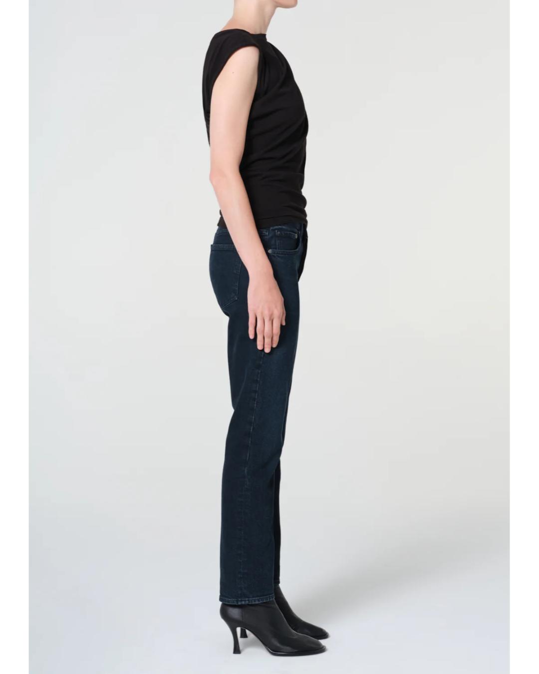 high rise dark blue denim pant with a straight leg to the ankle