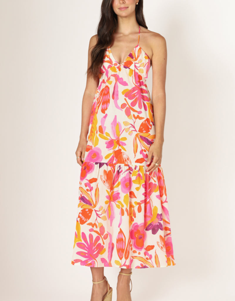 maxi dress that has a tiered bottom half and a pink and orange floral pattern