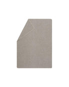 beige blanket with herringbone pattern