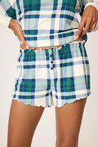 plaid shorts in green, blue and white