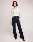 a woman wearing a cream and grey patterned fairisle sweater by gentle fawn