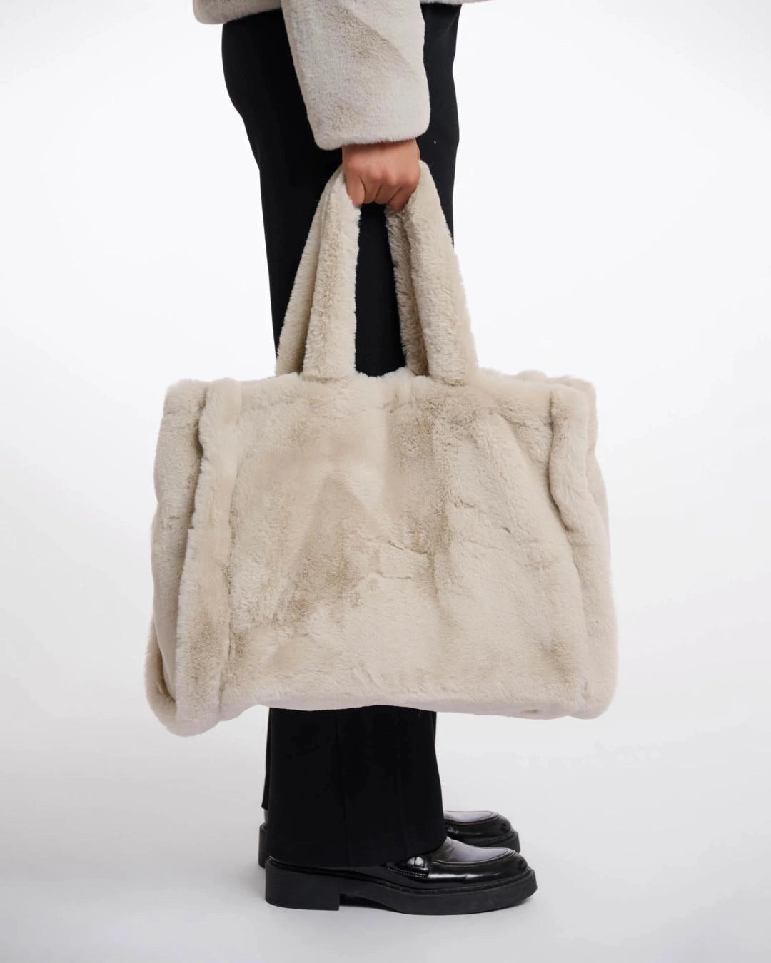 Beige faux fur bag in beige colour